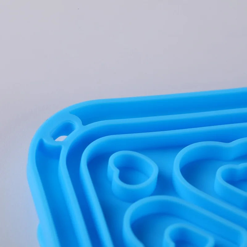 Slow feeder pet mat
